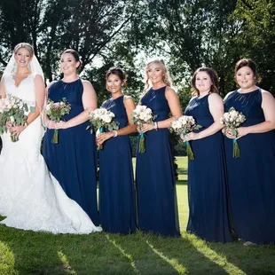 A beautiful gown and bridesmaids from Mori Lee Bridal.