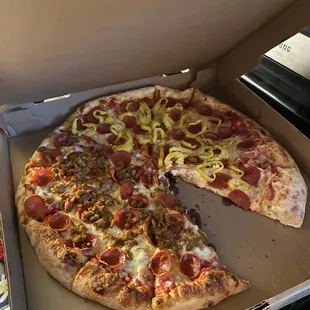 Large pizza half pepperoni and sausage and half pepperoni and banana peppers