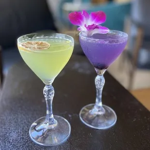 two cocktails on a table