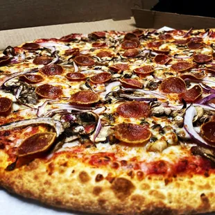 Pepperoni and red onion pie