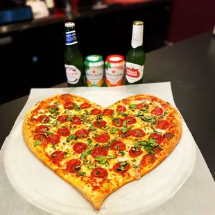 Heart shaped pizza. Available on Valentine&apos;s Day.