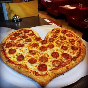 Heart shaped pizza. Available on Valentine&apos;s Day