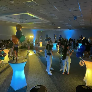 Up light rental with our bar tables, white scrims and wireless uplights for any event