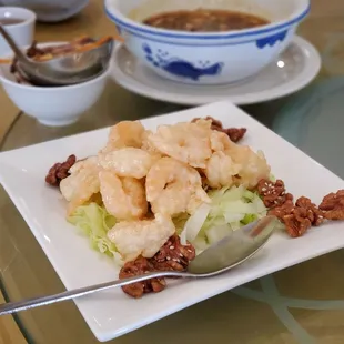 a plate of shrimp and lettuce