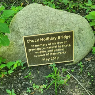 Plaque by bridge