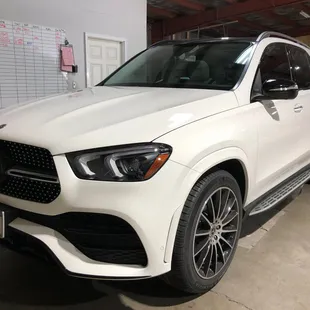 This vehicle got the Premium Paint Protection Film Package, AIR80 Ceramic Window Tint on the windshield, the panoramic roof, and the windows