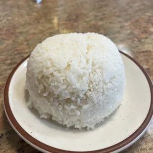 Entree come with a side of rice.