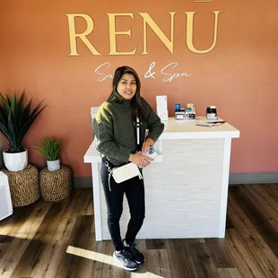 My wife checking in for her appointment .