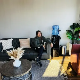 My Wife relaxing in Renu's comfortable waiting area.