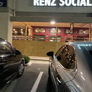 Front of the house looks boarded up but it's an attempt at creating a patio for the smokers