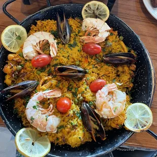 Seafood paella. What you see, shrimp and mussels are the only seafood in the dish. The rice is so good though.