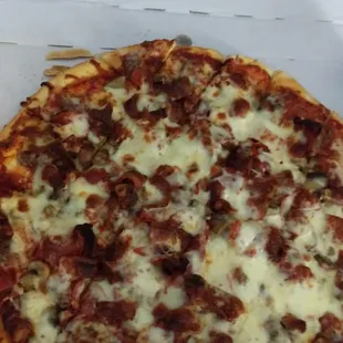 Sausage, pepperoni, mushroom, and bacon