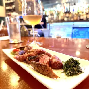 Chorizo, Picante, Salchiche, and Morcilla sausage bites.