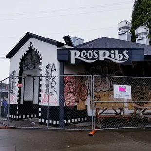 Boarded up but still open