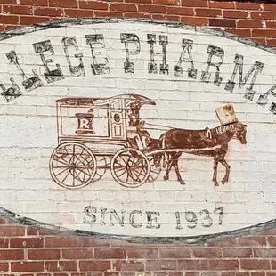 Coolness! This sign was preserved on the side of the building!