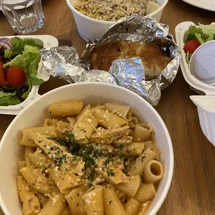 Rigatoni chicken and peas (front), spaghetti with white clam sauce (back)