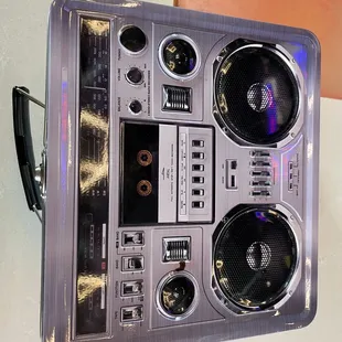 an old radio with speakers on it