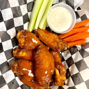chicken wings with carrots and celery
