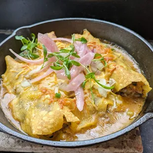 Smoked Brisket Enchilada ($19) - 4 stars. Tasty, good proportion of meat/cheese/tortilla. Lacking sauces, meat dry. Thu dinner 2024-04-11