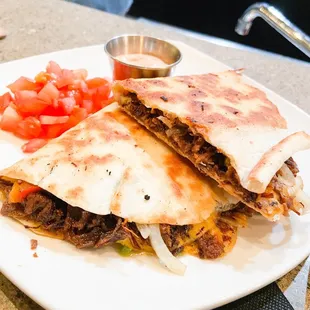 Brisket quesadilla (needs pickled jalapeños and onions)