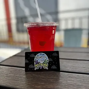 a drink in a plastic cup