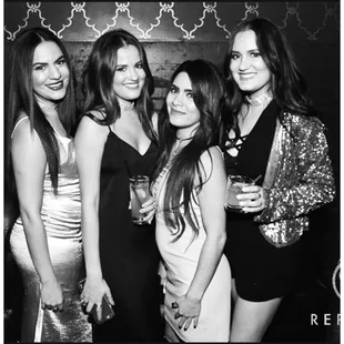 a group of women posing for a picture