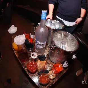 a bartender preparing drinks