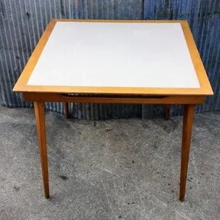 Mid Century Blonde folding card  table with canvas top (In store as of 6/9/18)