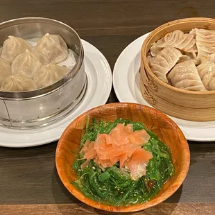 Soup dumplings, Pork dumplings and seaweed salad