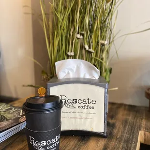 a cup of coffee on a table