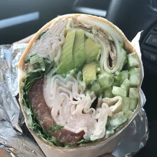 Yummy turkey avocado wrap. I added cucumber.