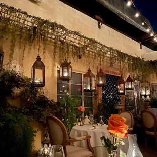 a dining area with tables and chairs