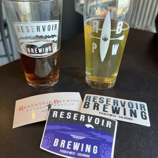 two pints of beer and a beer coaster