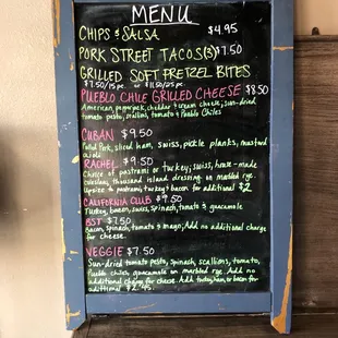 a menu on a chalk board