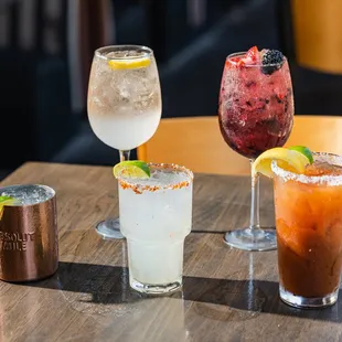 a variety of cocktails on a table
