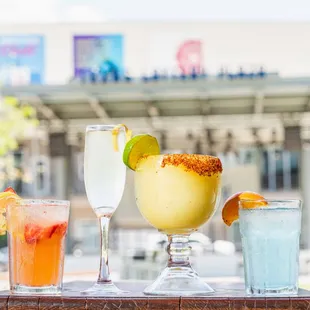 a variety of cocktails on a table