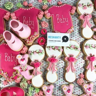 Customized baby shower with garden theme cookies.