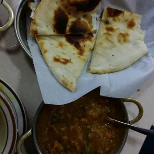 Naan and mixed vegetable curry.
