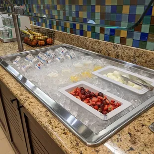 Chilled milk, juice, eggs, and fruit