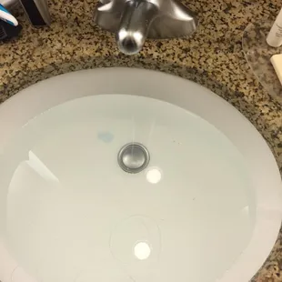 Can't get the sink stopper to come up. Tried everything...