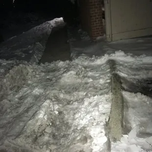 Snow/ICE is not removed properly... they placed it in front of the entrance to the only trash compactor for the complex.