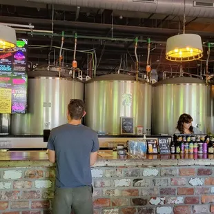 a man standing at the bar