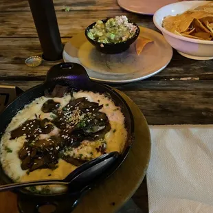 Mushroom queso fundido and guac