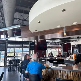 customers sitting at the bar