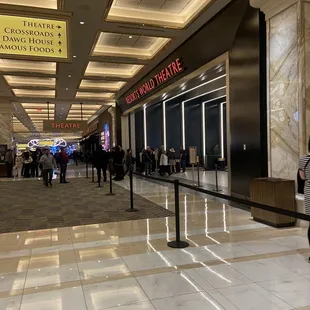 people walking through the lobby