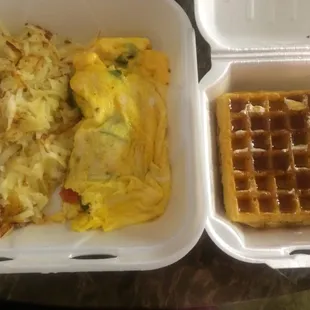 Hash browns, ham/cheese/veggie omelette, waffles. . . Everything was good, but the waffles were a little salty. . .