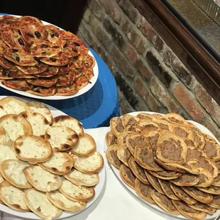 Host your private event at Rest House Cafe! - pictured here is finger food versions of our cheese manaeesh, veggie pizza and meat pizza!