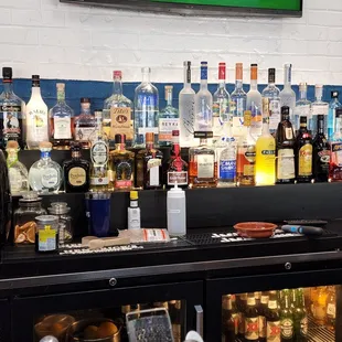 a bar with a television in the background