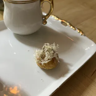 a small pastry on a white plate