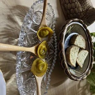 olives and bread on a plate